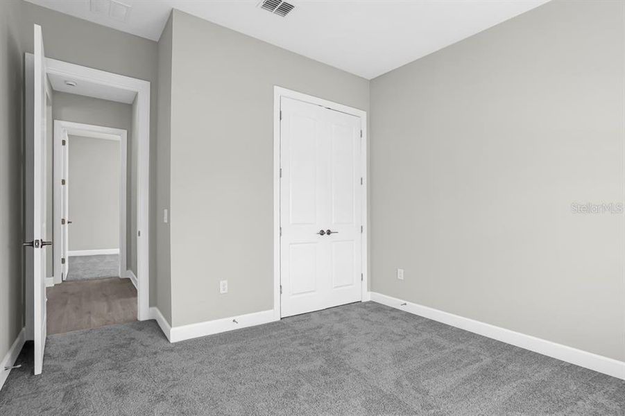 Spacious, unfurnished interior of a new home in Esplanade at Center Lake Ranch, St. Cloud (Image 20).