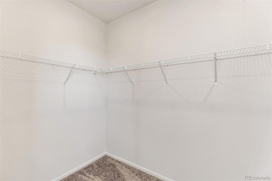 Spacious, unfurnished interior of a new home in Terrain Oak Valley, Castle Rock (Image 25).