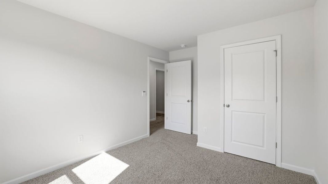 Spacious, unfurnished interior of a new home in Waverly Station, Greenwood (Image 27).