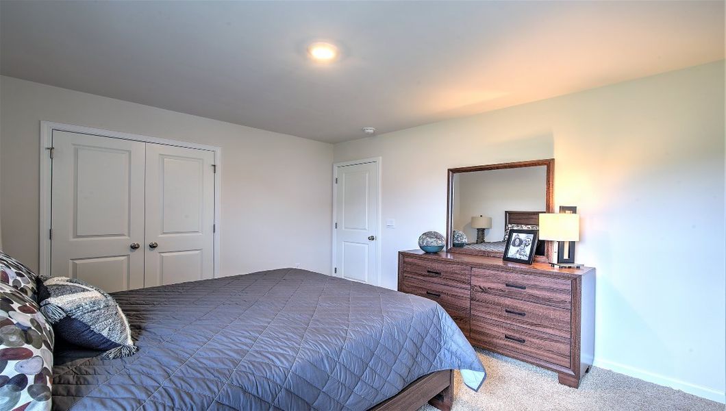 Furnished interior view inside a new home in Reserve at Tap Root Farms, Fletcher (Image 44). Furnished interior view inside a new home in Reserve at Tap Root Farms, Fletcher (Image 44).