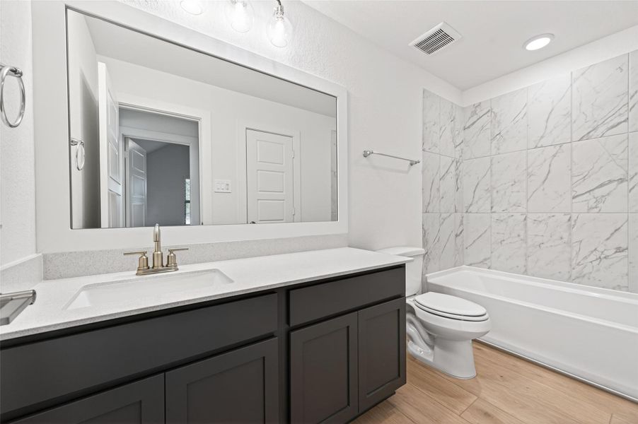 Furnished interior view inside a new home in Sorella, Tomball (Image 30).