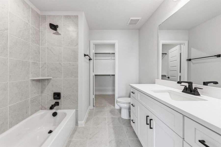Friends and family will feel right at home in any of the beautifully finished guest baths our 4204 floor plan has to offer.