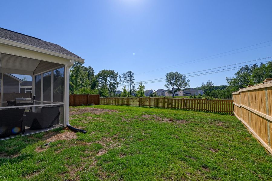 Exterior details and patio area of a home in Heron's Walk at Summers Corner, Summerville (Image 27).