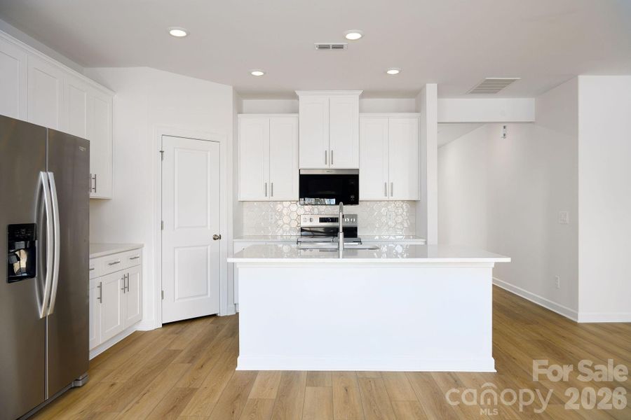 Furnished interior view inside a new home in , Mocksville (Image 13).