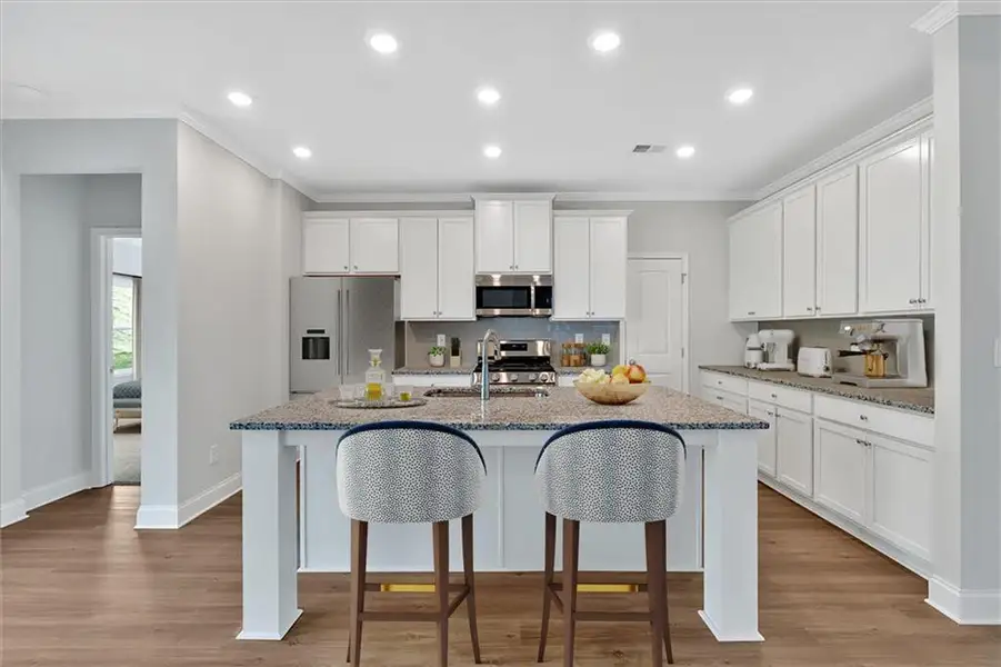 Furnished interior view inside a new home in Heritage Pointe at The Georgian, Villa Rica (Image 4).