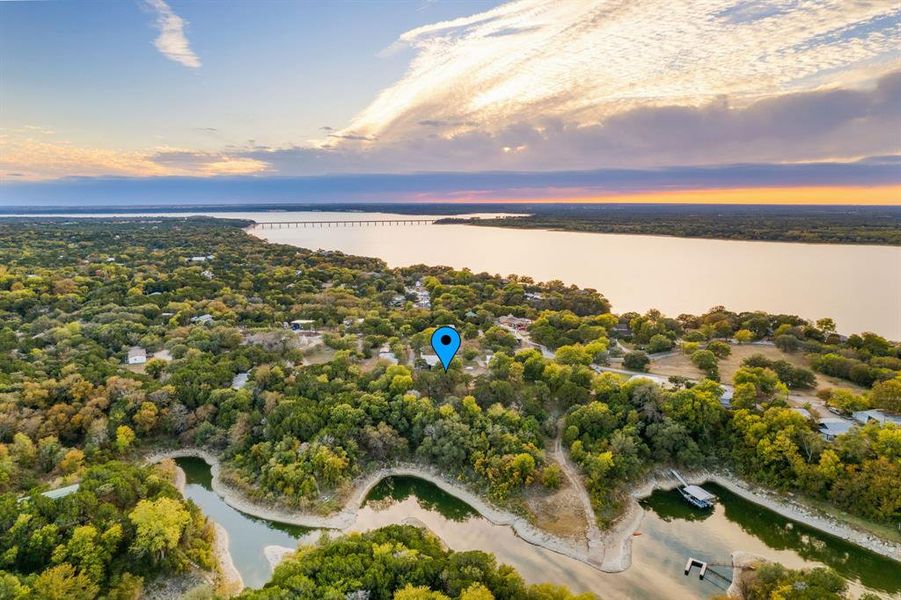 Welcome to 240 Canyon Drive with backyard access to Lake Whitney!