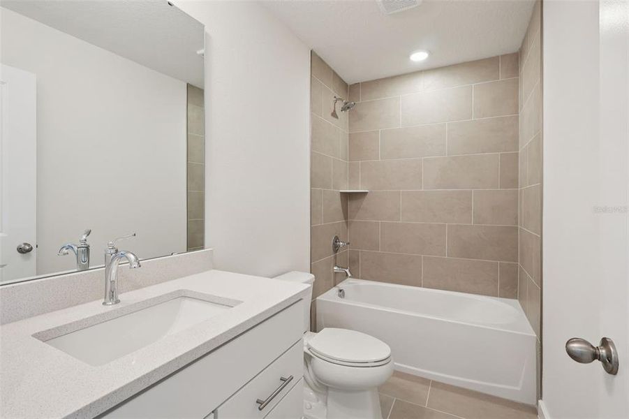 Furnished interior view inside a new home in Cyrene at Harmony, St. Cloud (Image 9).