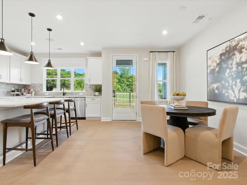 Dining space conveniently off the kitchen. *Model Photos | Actual finishes, structural selections, and orientation may vary. Dining space conveniently off the kitchen. *Model Photos | Actual finishes, structural selections, and orientation may vary.