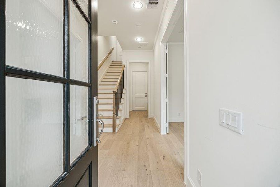 Welcome in to 7506 Viano. First floor offers a large bedroom to the right of your entry and a mud-room just through the cased opening. Welcome in to 7506 Viano. First floor offers a large bedroom to the right of your entry and a mud-room just through the cased opening.