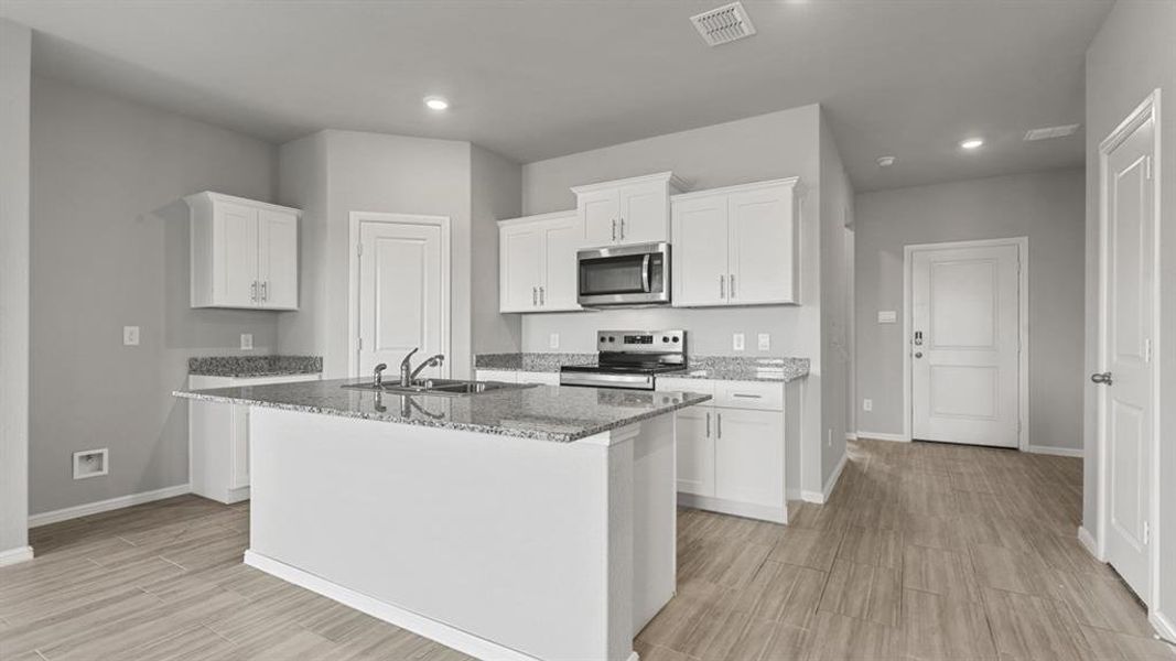 Furnished interior view inside a new home in Lonestar at Liberty Trails, Fort Worth (Image 5).