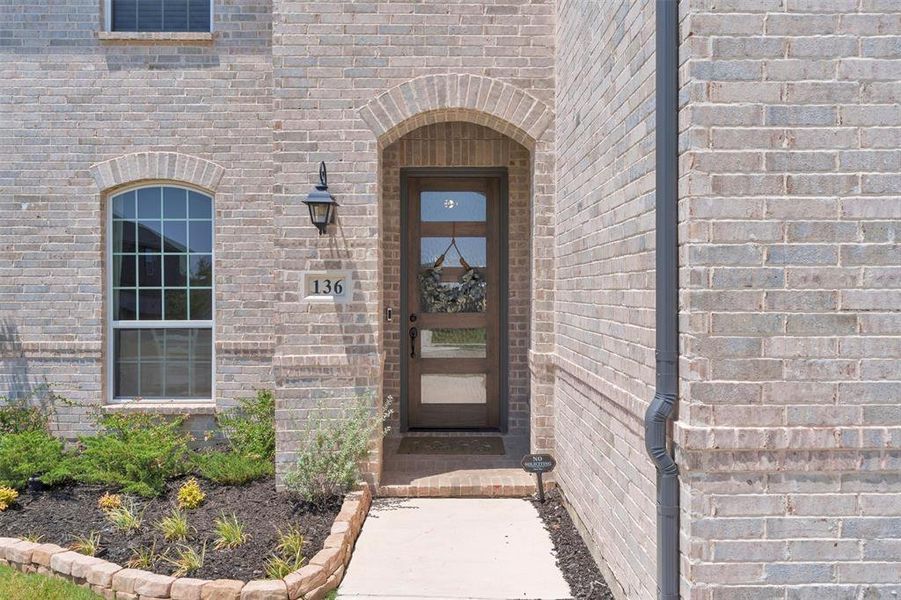 Front exterior of a new home in , Newark, TX, highlighting curb appeal (Image 1).