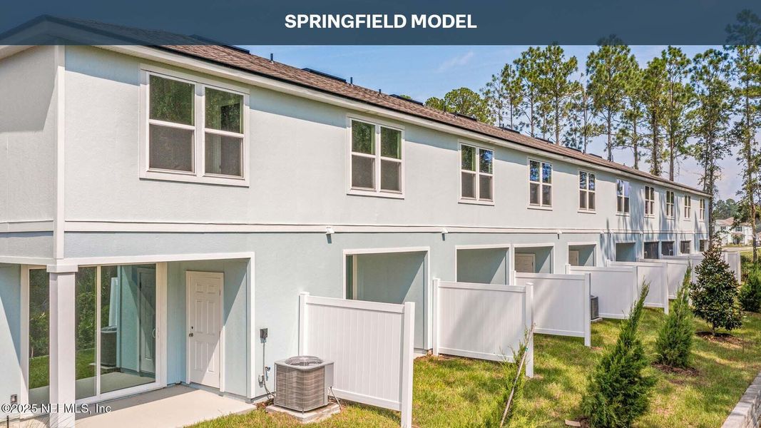 Front exterior of a new home in Stokes Landing, St. Augustine, FL, highlighting curb appeal (Image 22).