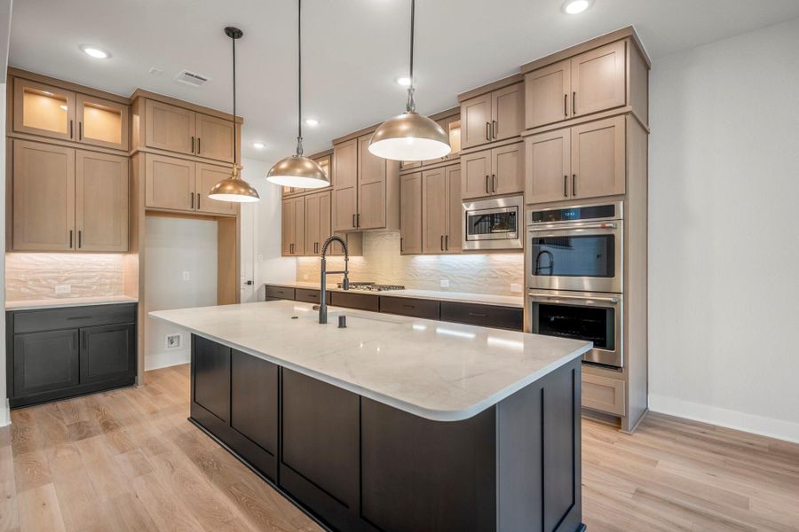 Furnished interior view inside a new home in ARTAVIA 70′ Lots, Conroe (Image 6).