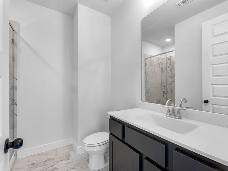 Furnished interior view inside a new home in Harvest Green, Richmond (Image 5).