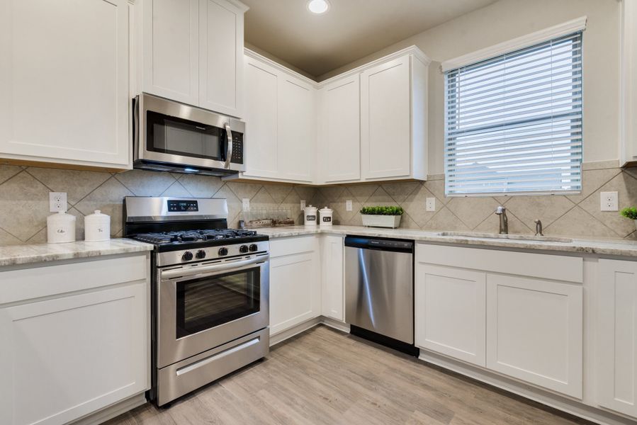 Representative furnished interior of a home built from the Floor Plan 2102 by Colina Homes in Sunterra, Katy (Image 26). Representative furnished interior of a home built from the Floor Plan 2102 by Colina Homes in Sunterra, Katy (Image 26).