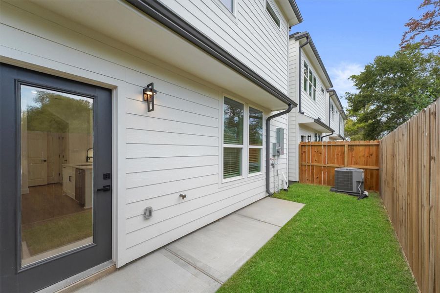 Exterior details and patio area of a home in , Houston (Image 4). Exterior details and patio area of a home in , Houston (Image 4).