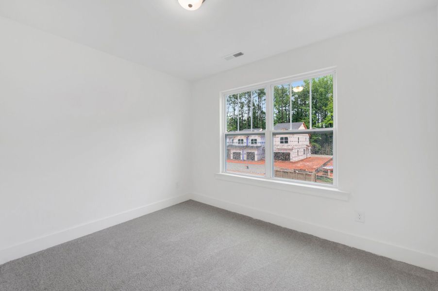 Spacious, unfurnished interior of a new home in Ashmore Townes, Garner (Image 28). Spacious, unfurnished interior of a new home in Ashmore Townes, Garner (Image 28).