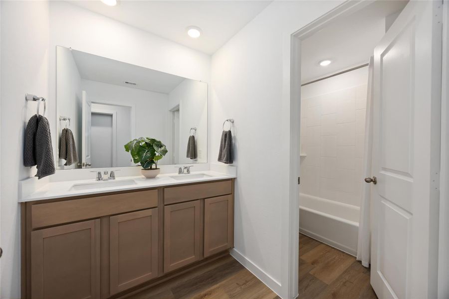 Furnished interior view inside a new home in Grand West, Houston (Image 11).