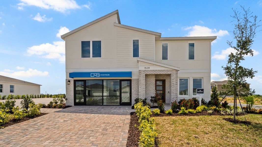 Representative exterior photo of a completed home built from the Highbourne by DRB Homes in Hamilton Bluff, Haines City, FL (Image 23). Representative exterior photo of a completed home built from the Highbourne by DRB Homes in Hamilton Bluff, Haines City, FL (Image 23).