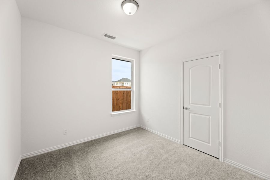 Representative unfurnished interior of a home built from the Blackburn by UnionMain Homes in Reunion, Rhome (Image 14).