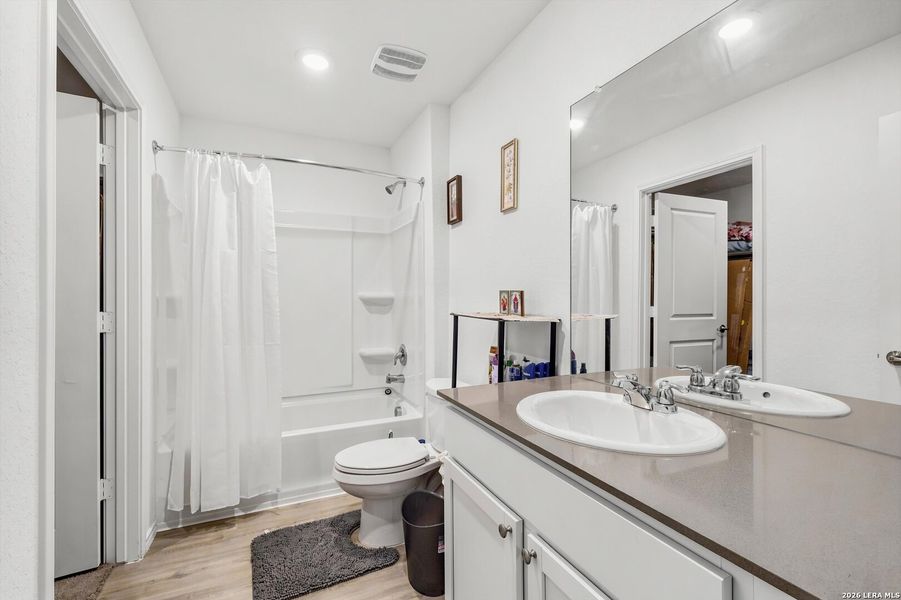 Furnished interior view inside a new home in Tarasco Gardens, San Antonio (Image 15).