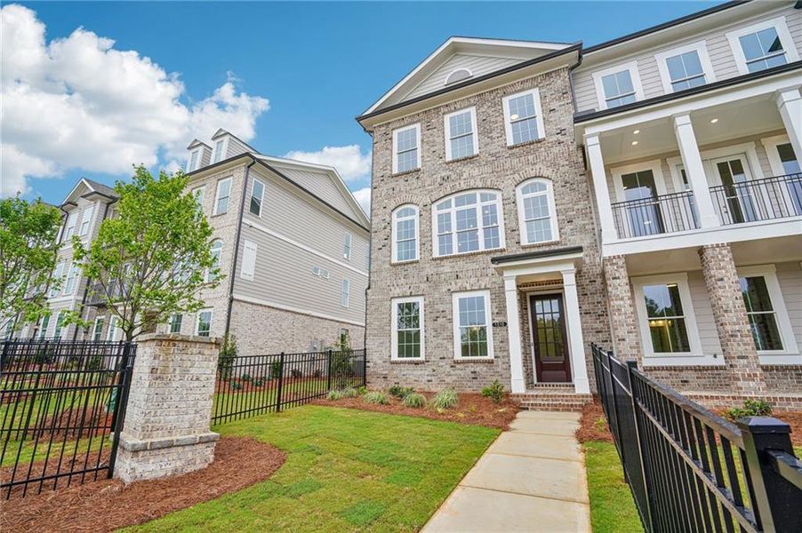 Front exterior of a new home in Waterhaven, Cumming, GA, highlighting curb appeal (Image 21).