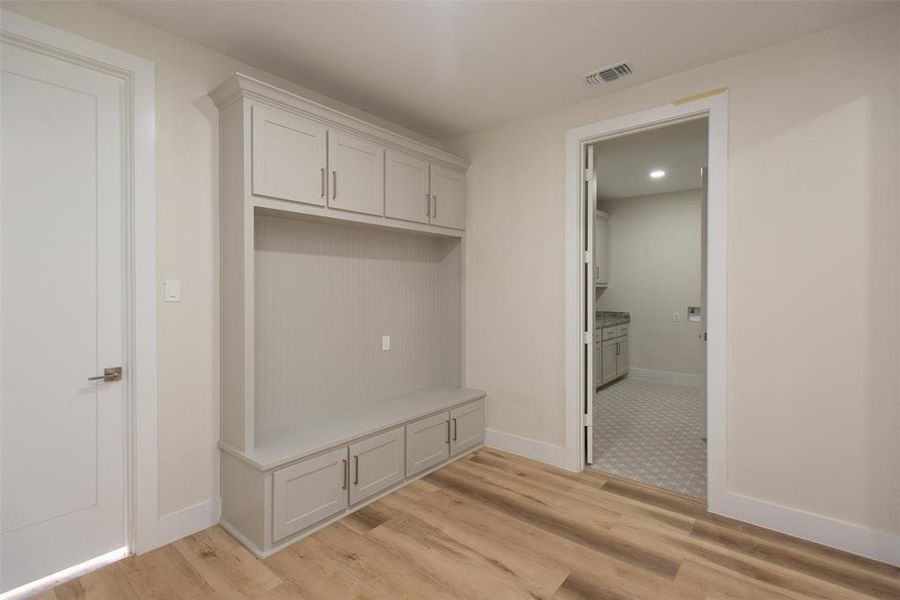 Mudroom featuring light hardwood / wood-style floors