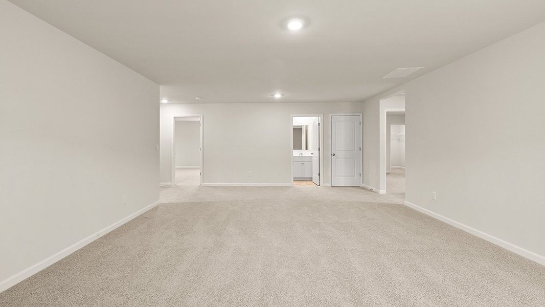 Representative unfurnished interior of a home built from the Mansfield by D.R. Horton in Northwoods at Mirror Lake, Villa Rica (Image 33).