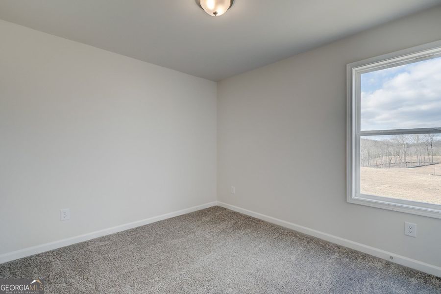 Spacious, unfurnished interior of a new home in Enclave at Logan Point, Loganville (Image 28).