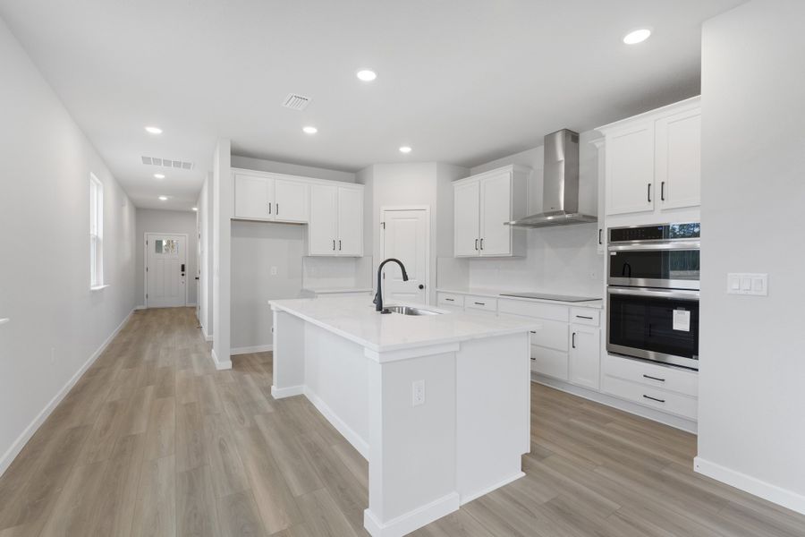 Lot 140 Chef's Kitchen with White Cabinets at The Preserve at Camden Woods