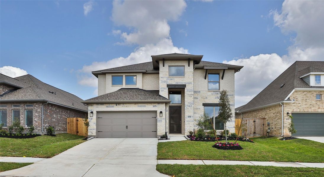 Front exterior of a new home in Escondido, Magnolia, TX, highlighting curb appeal (Image 2).