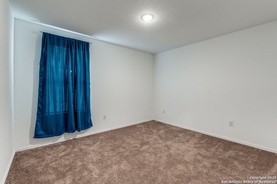 Spacious, unfurnished interior of a new home in Mission del Lago: Cottage Collection, San Antonio (Image 12).