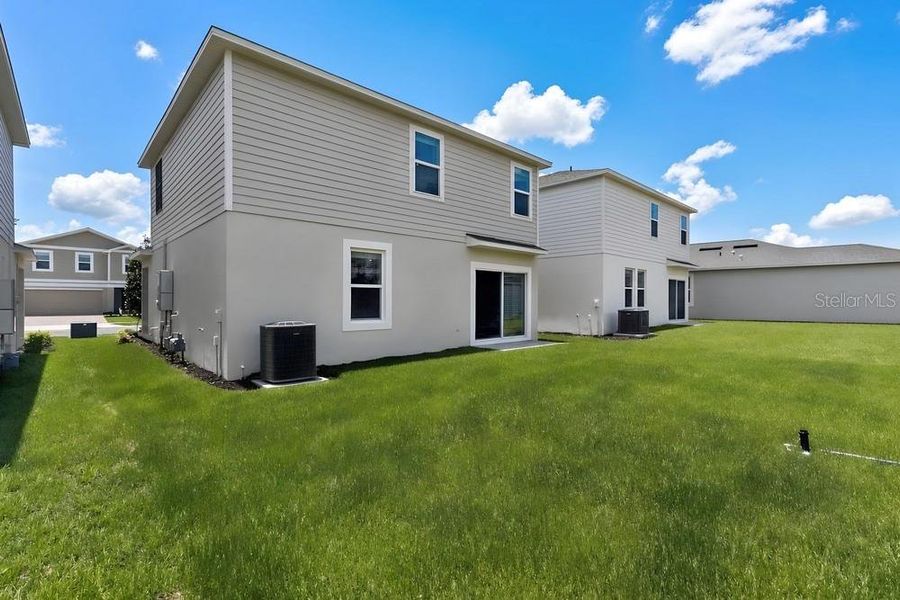 Exterior details and patio area of a home in Waterstone, Groveland (Image 32).