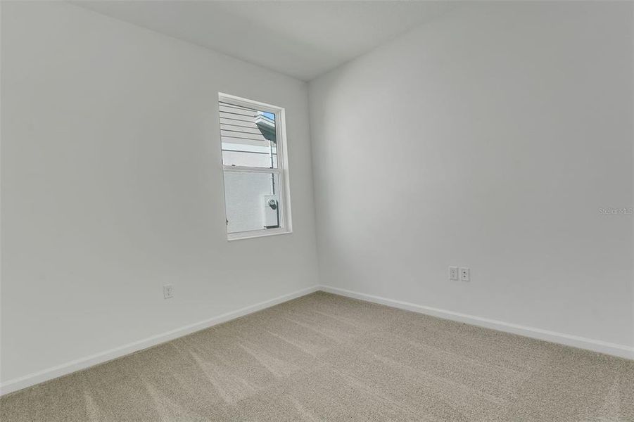 Spacious, unfurnished interior of a new home in Reserve at Hammock Oaks, Lady Lake (Image 32).