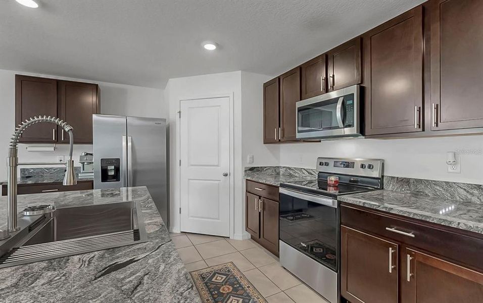 Furnished interior view inside a new home in Berry Bay, Wimauma (Image 31). Furnished interior view inside a new home in Berry Bay, Wimauma (Image 31).