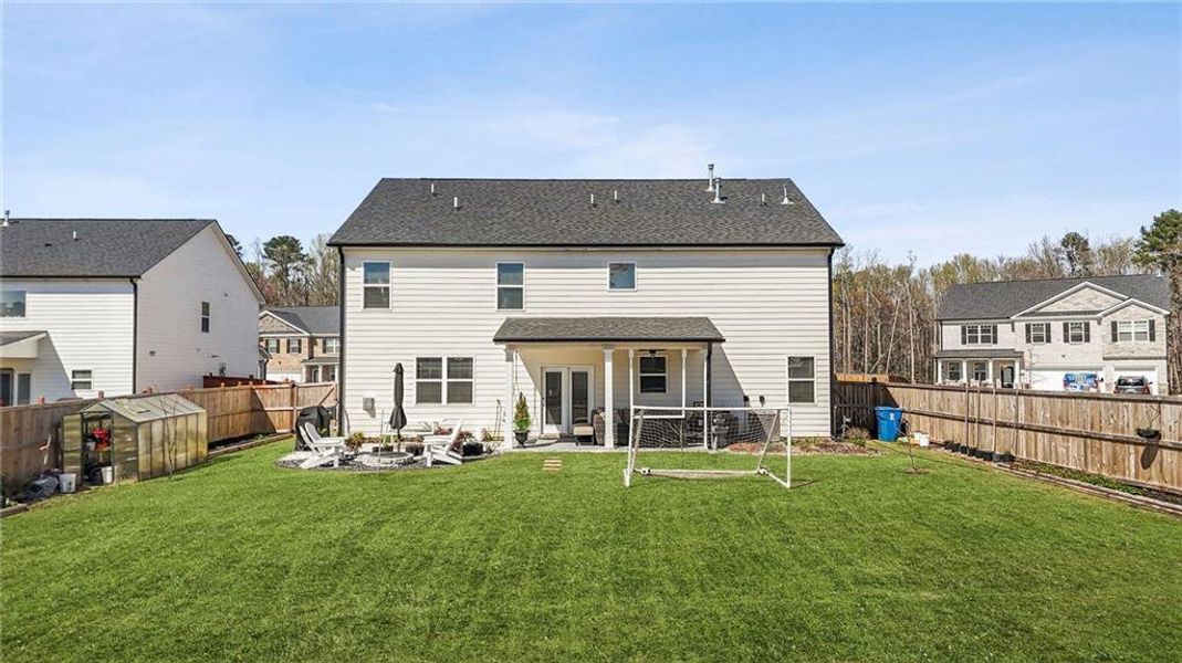 Exterior details and patio area of a home in Independence, Loganville (Image 32).