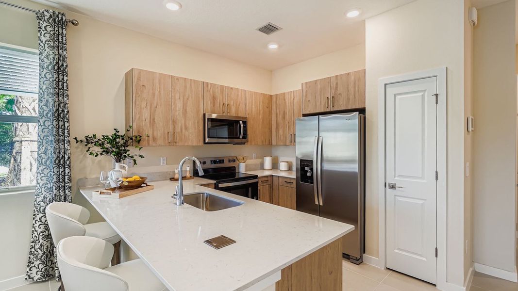Representative furnished interior of a home built from the Bondi by D.R. Horton in Lakeside Landing, Royal Palm Beach (Image 12).