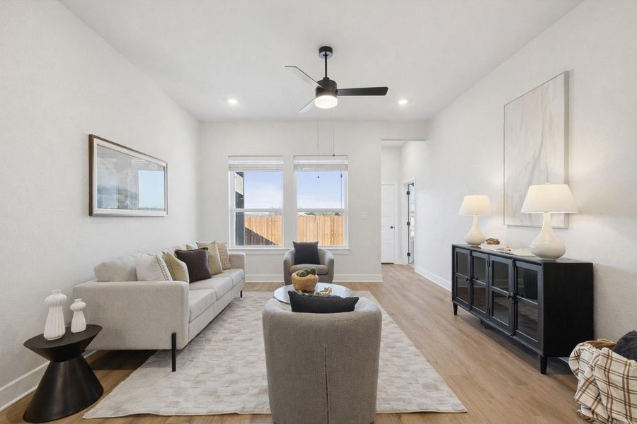 Family Room (Staged)[Photos shown are from a completed home with the samefloorplan and similar design selections. Actual design selections may very slightly]