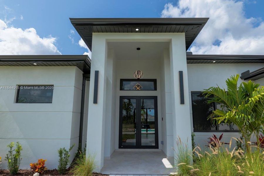 Front exterior of a new home in , Cape Coral, FL, highlighting curb appeal (Image 16).