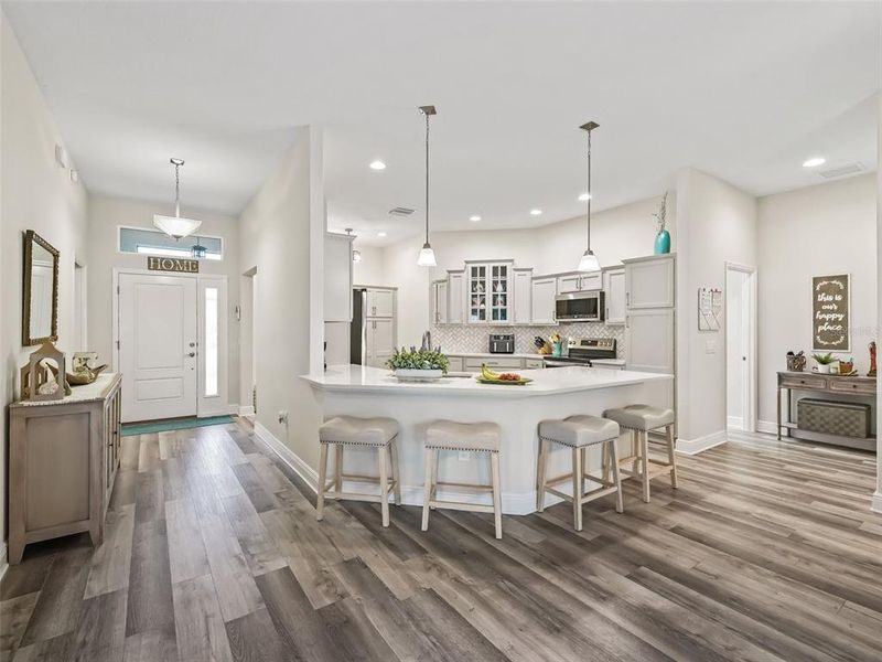 Foyer and Kitchen area with breakfast bar