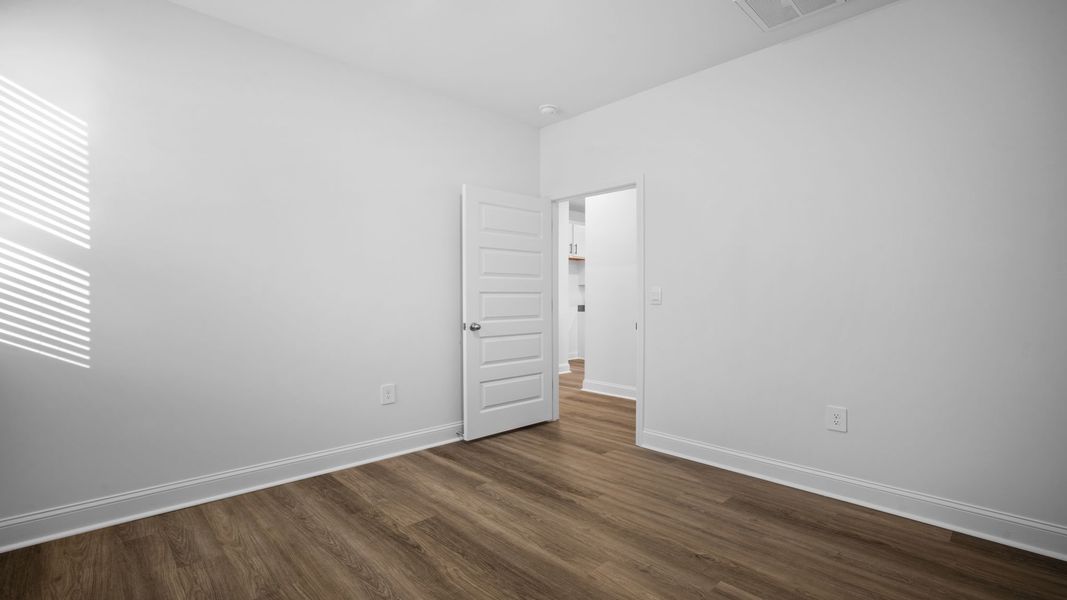 Spacious, unfurnished interior of a new home in The Lakes at North Glynn, Brunswick (Image 22).