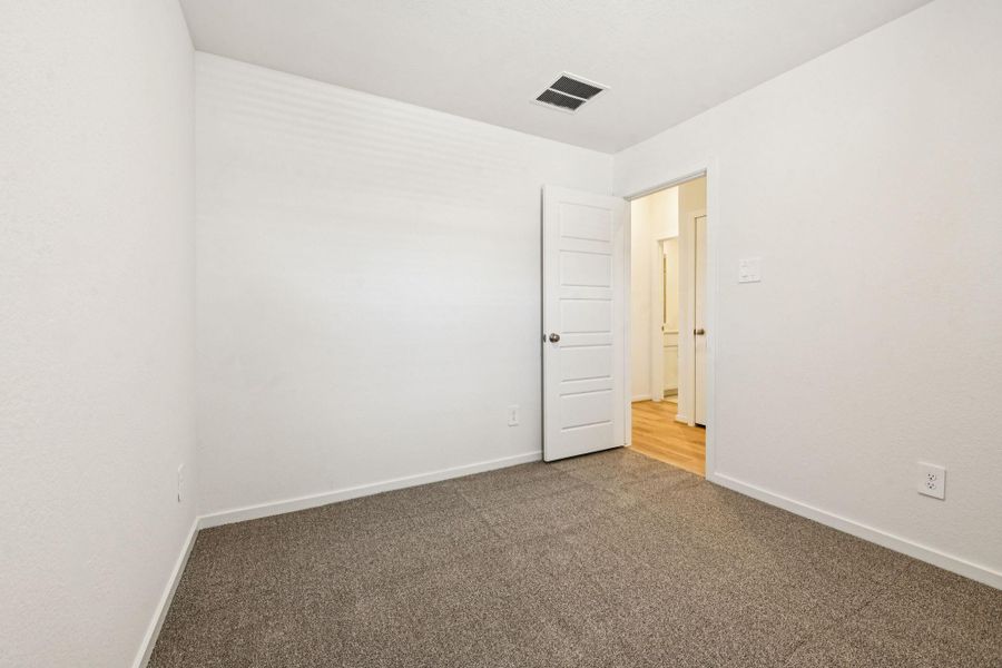 Spacious, unfurnished interior of a new home in Granger Pointe - Traditional Series, Conroe (Image 26).