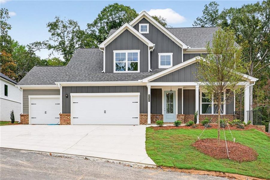 Front exterior of a new home in The Manor at Gainesville Township, Gainesville, GA, highlighting curb appeal (Image 23).