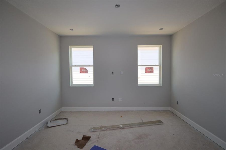 In-progress construction of a new home in Lake Star at Ovation, Winter Garden, FL (Image 19).