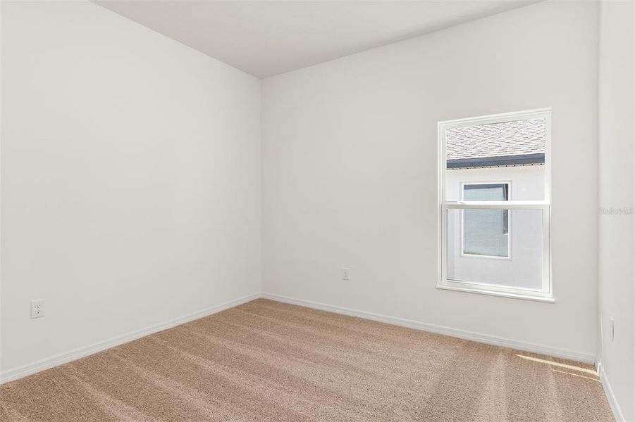 Spacious, unfurnished interior of a new home in Peach Crossings, Winter Haven (Image 19).