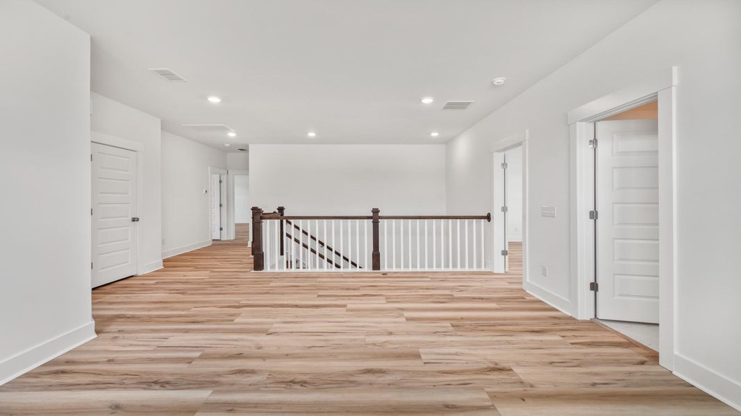 Spacious, unfurnished interior of a new home in Oak Bend, James Island (Image 17). Spacious, unfurnished interior of a new home in Oak Bend, James Island (Image 17).