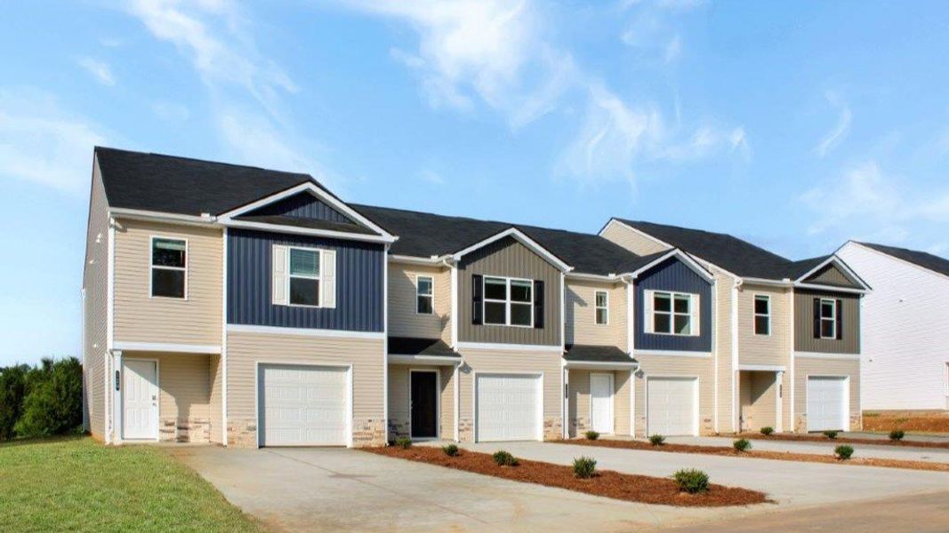 Front exterior of a new home in Owensby Farms Townhomes, Dayton, TN, highlighting curb appeal (Image 2). Front exterior of a new home in Owensby Farms Townhomes, Dayton, TN, highlighting curb appeal (Image 2).