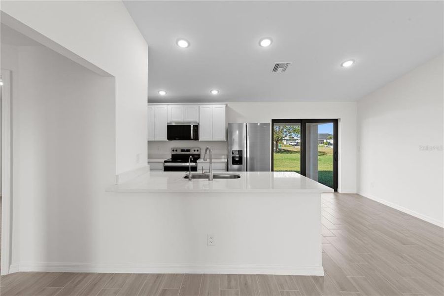 Furnished interior view inside a new home in , Port Charlotte (Image 5). Furnished interior view inside a new home in , Port Charlotte (Image 5).