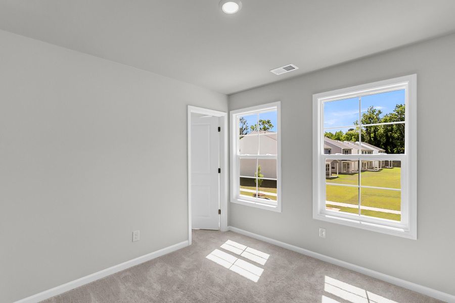 Spacious, unfurnished interior of a new home in Central Creek, Goose Creek (Image 22).