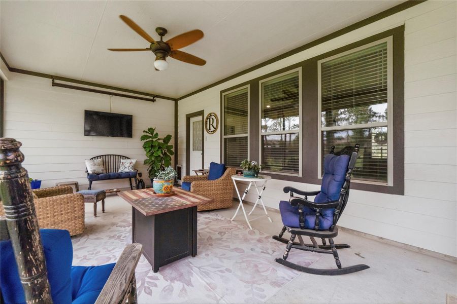 This screened-in porch is the perfect place to start slow mornings or unwind at sunset, offering peaceful backyard views and a comfortable space to relax year-round.